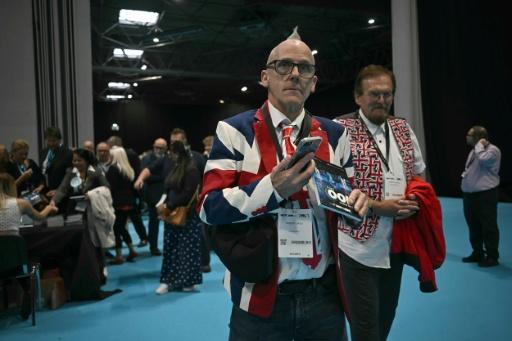 Delegates seemed unconcerned by the latest revelations — Paul ELLIS / AFP