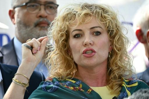 Kate Lincoln-Goldfinch, the attorney for Wilber Rafael Garces Perez, a Venezuelan man shot by immigration agents, addresses a press conference in Austin, Texas — RONALDO SCHEMIDT / AFP