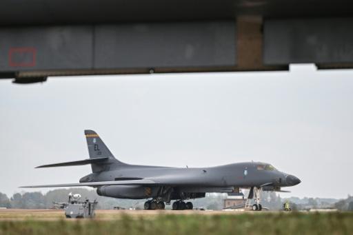 UK village on edge over threats to air base in terror alert