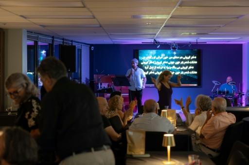 Members of the Iranian community attend a music and karaoke gathering at the Arya Center in Tysons Corner, Virginia — Amid FARAHI / AFP