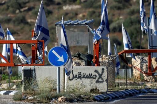 Settler attack on West Bank village injures Israeli forces, drawing rare rebuke