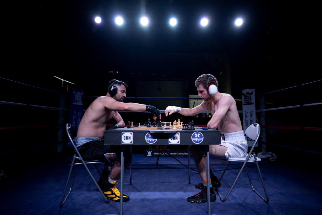Chessboxer Shayan Zarein Dolab competes against Martin Neu at the Chox Con Chessboxing Festival